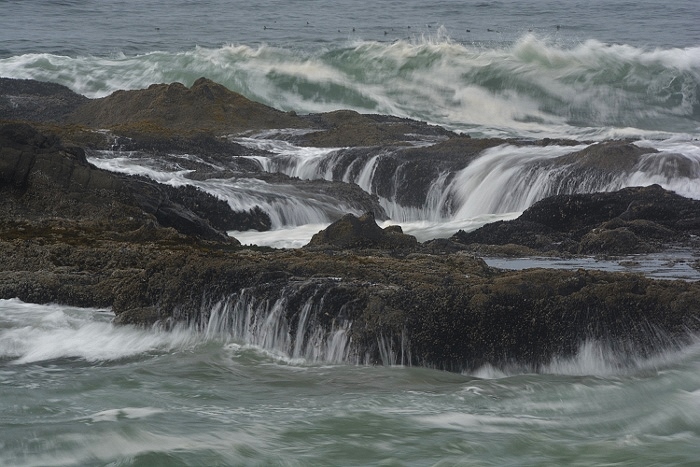 rushing water over rocks in slow motion